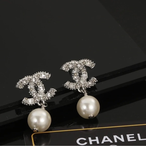 CHANEL Silver and Pearl Logo Earrings - Picture 1 of 3